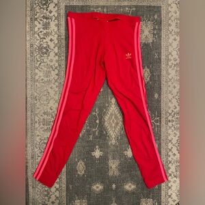 Adidas Red and Pink Sweatpants with Three-Stripe Design